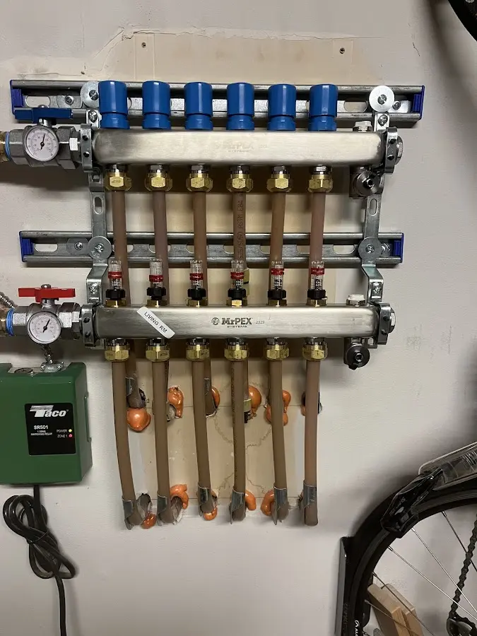 Plumber performing Leak Detection at a residential property in Troy